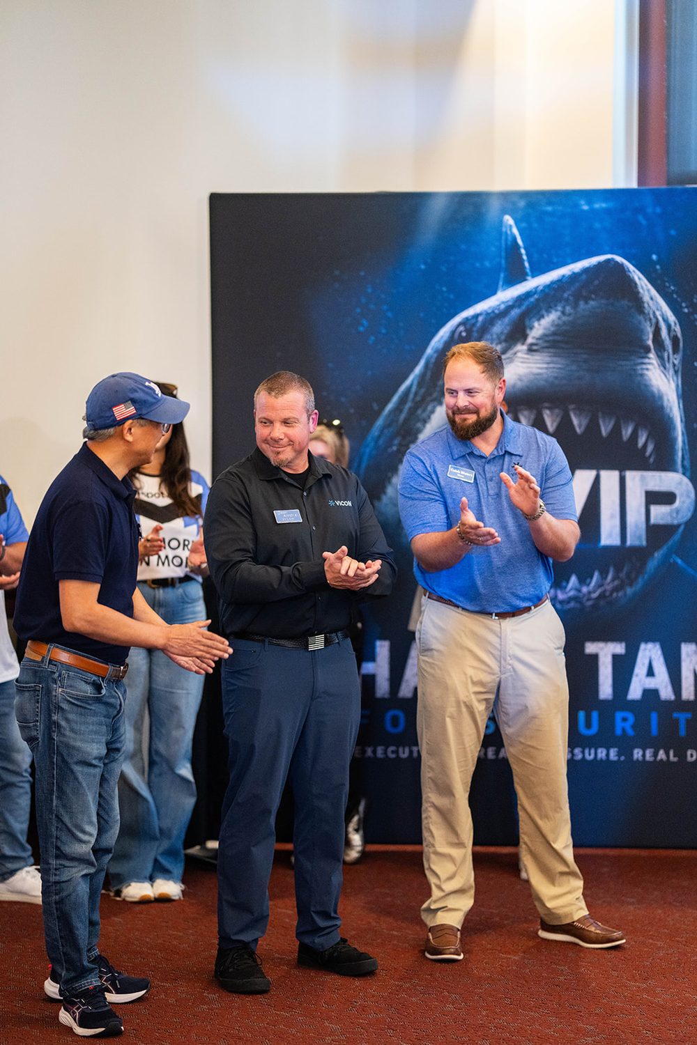 Applause and a handshake as a winner is recognized